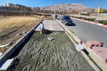 اجرای عملیات جدول گذاری و خاکبرداری معابر بلوار نظام مهندسی در ساماندهی و بهسازی معابر